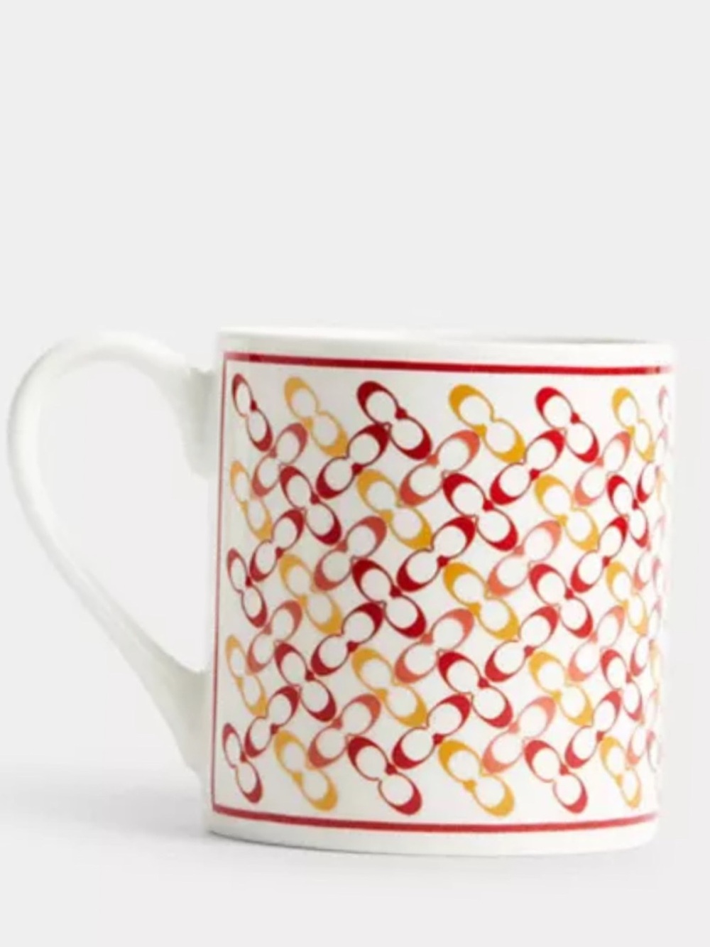 Coach White Mug with Red and Yellow Interlocking Chain Motif